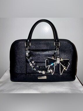 Burberry Saffiano Ceremonial Bag
Black Leather.  Handmade Purse Charm included.